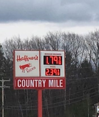 Country mile store sign