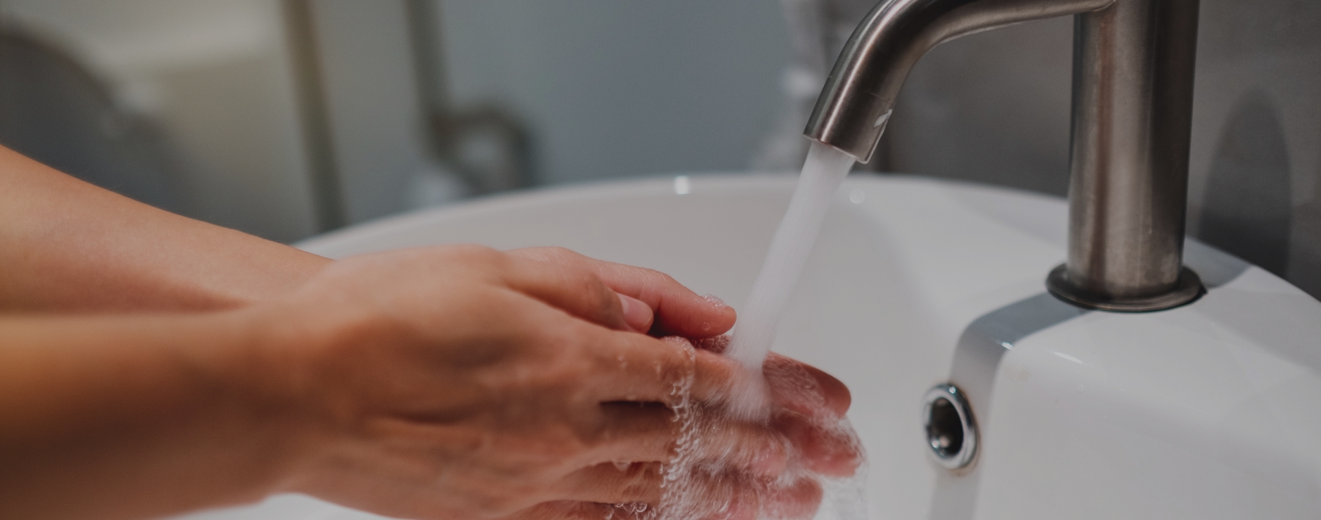 Washing hands in warm water